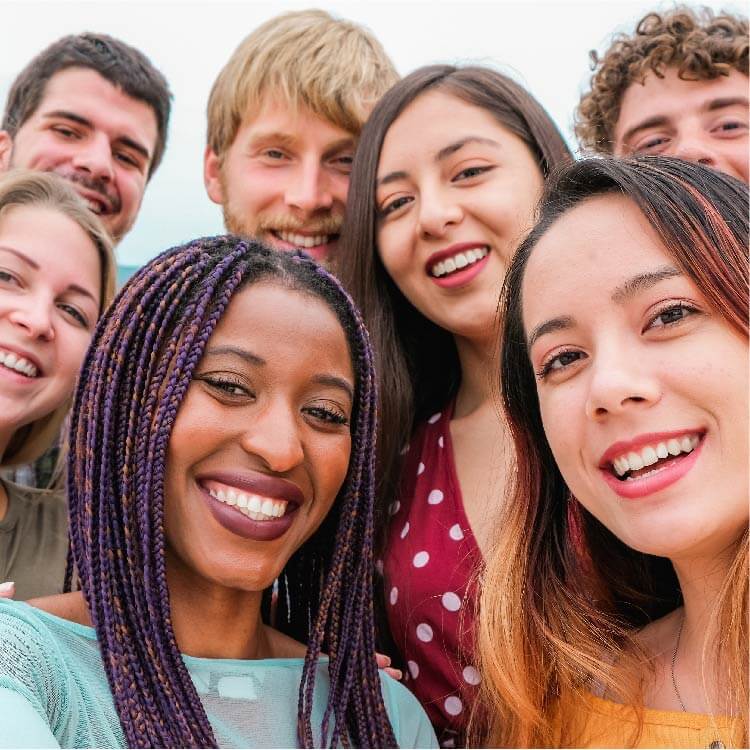 Young people taking selfies